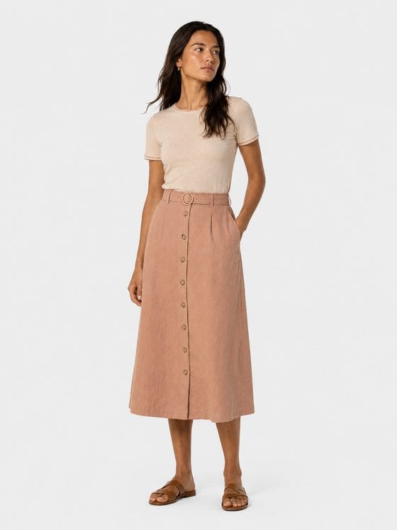 Look 04 — the terracotta midi skirt with a ribbed knit