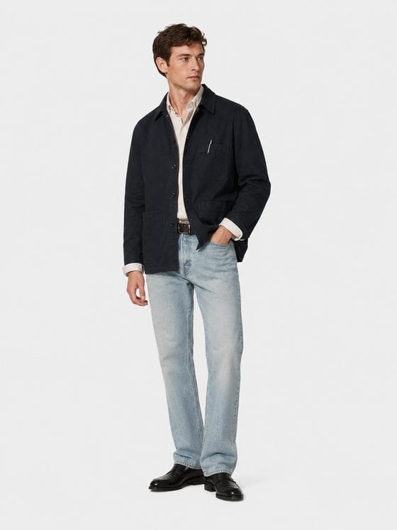 Look 05 — the navy chore jacket over a shirt with denim
